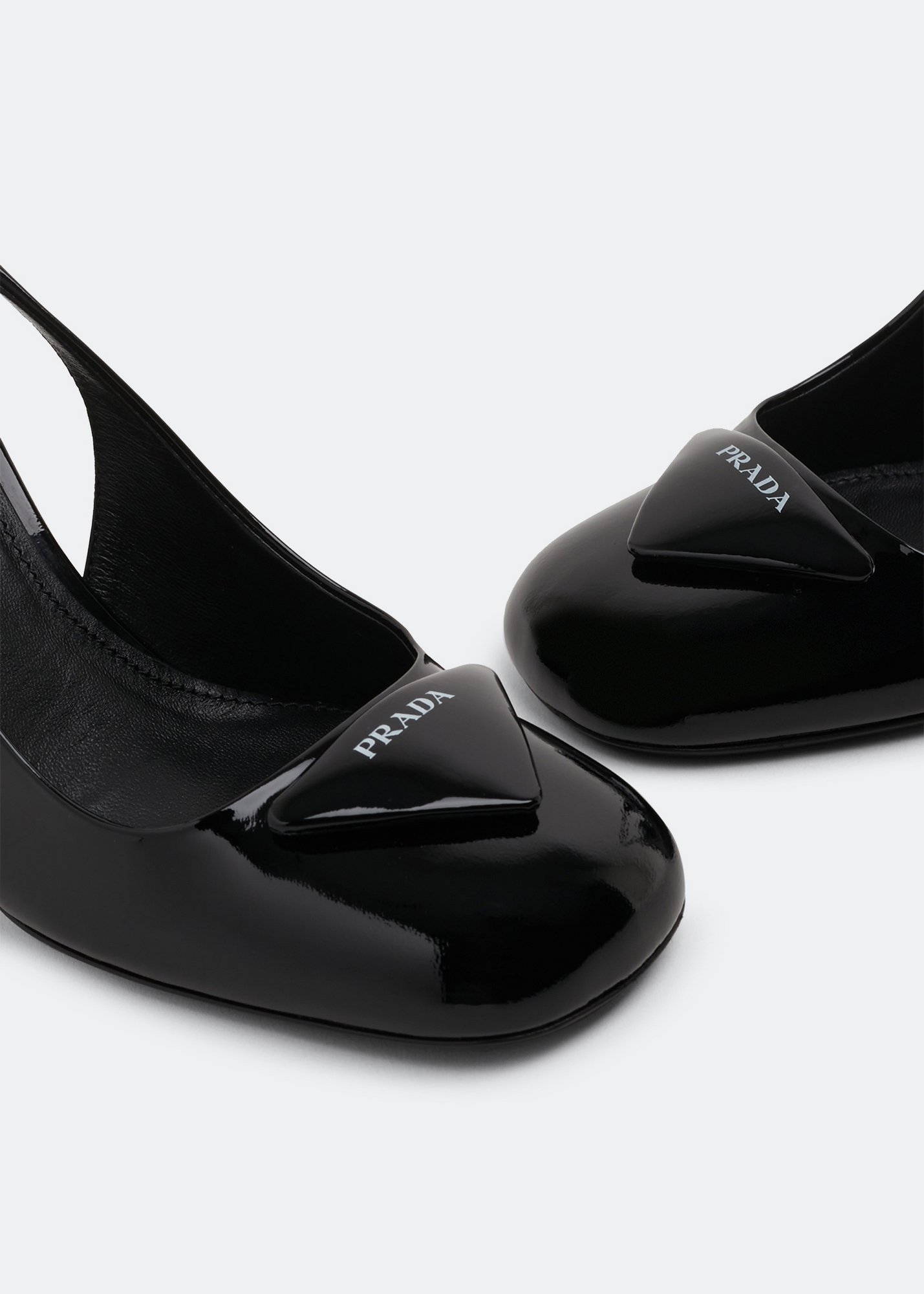 

Patent leather slingback pumps, Black