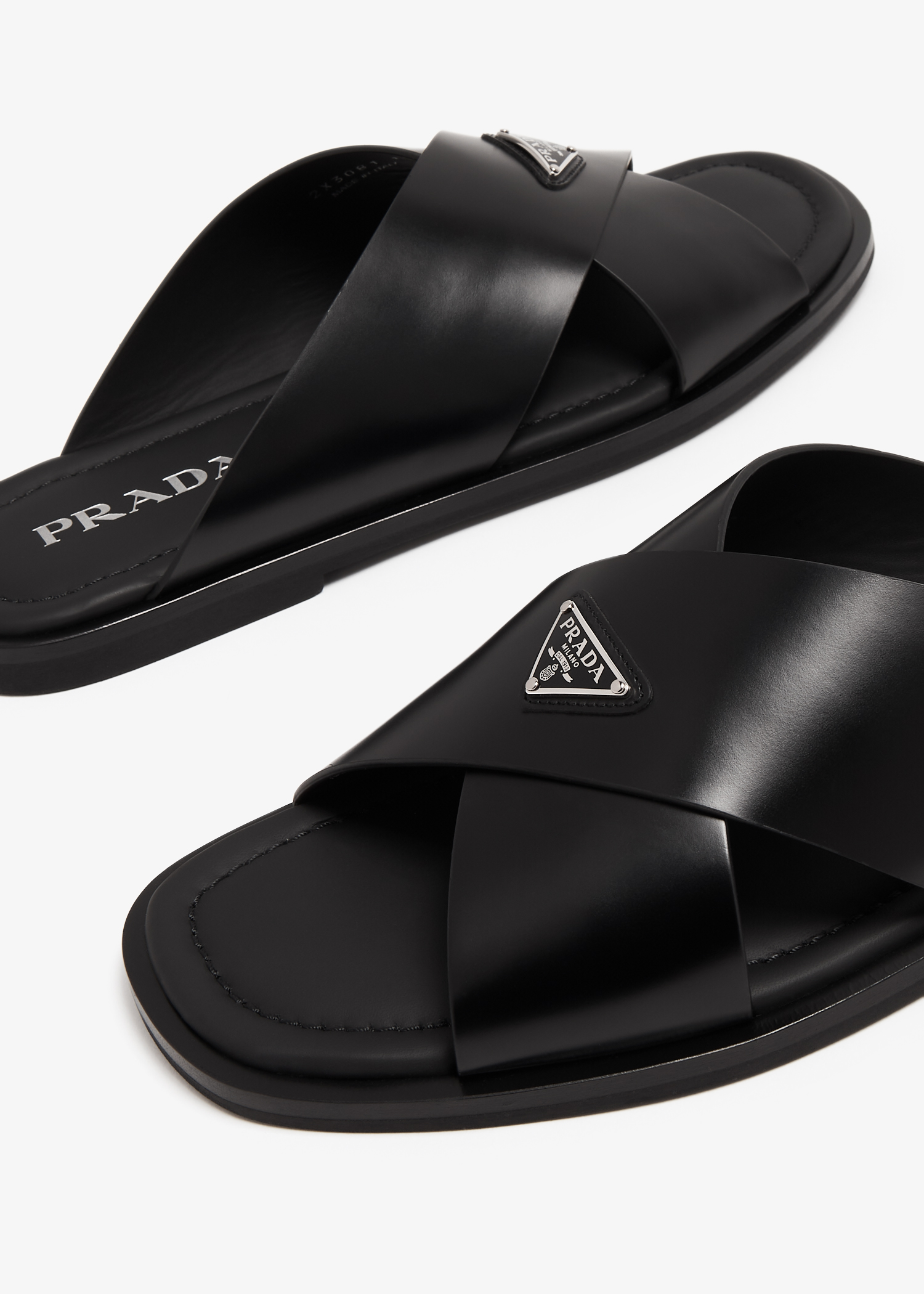 Prada Brushed leather crisscross sandals for Men Black in UAE