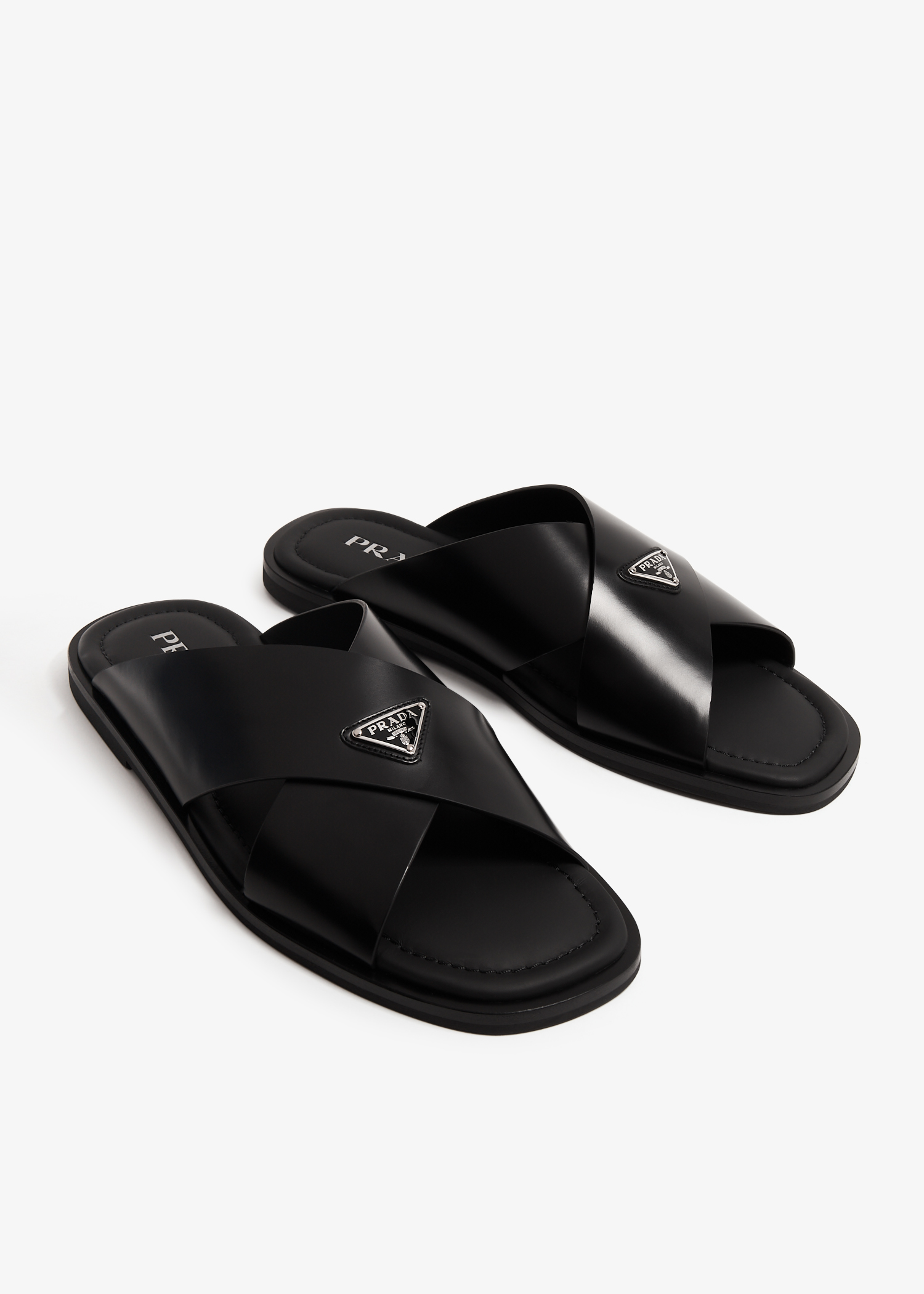 Prada Brushed leather crisscross sandals for Men Black in UAE