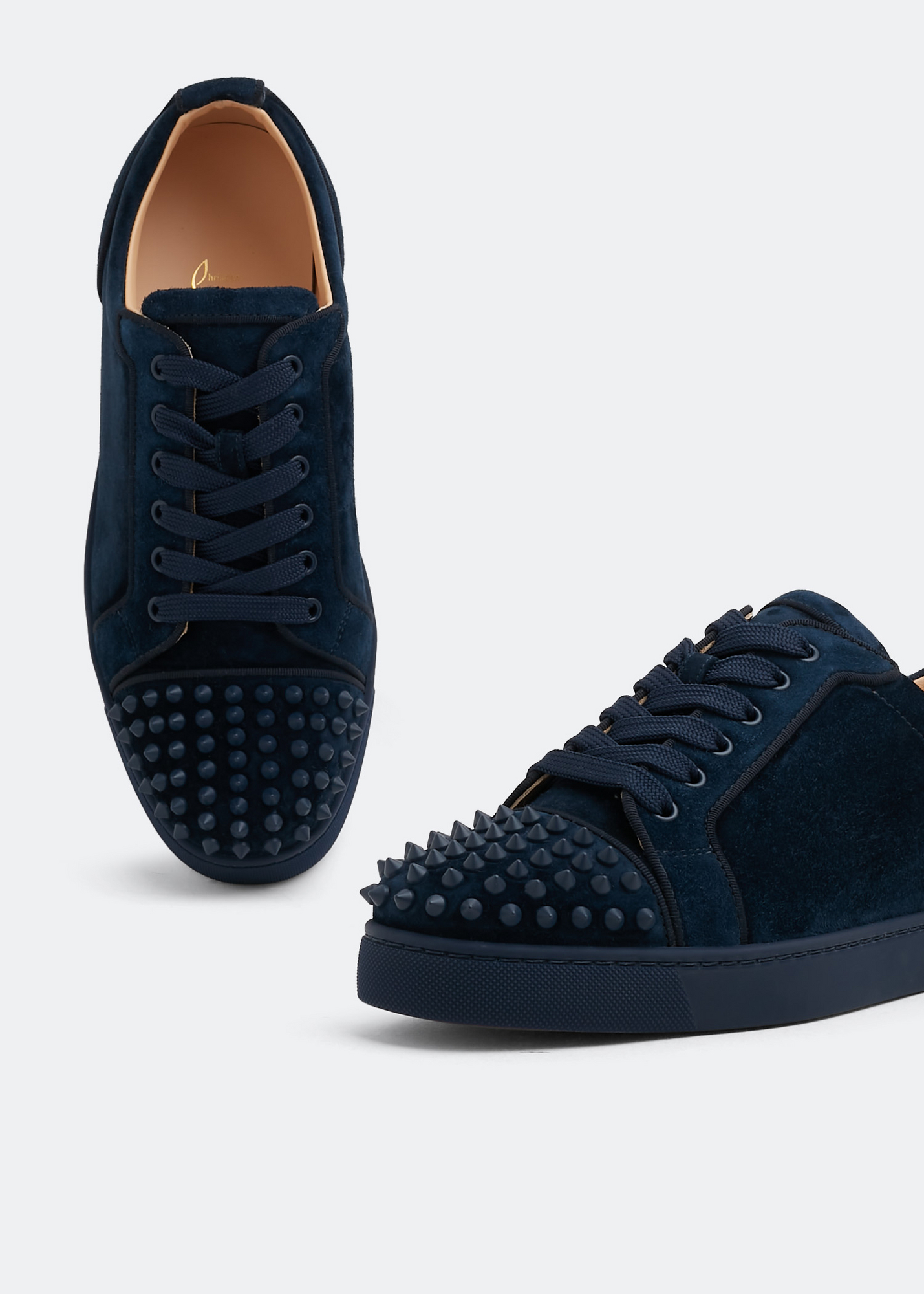 Blue spiked 2024 louboutin trainers