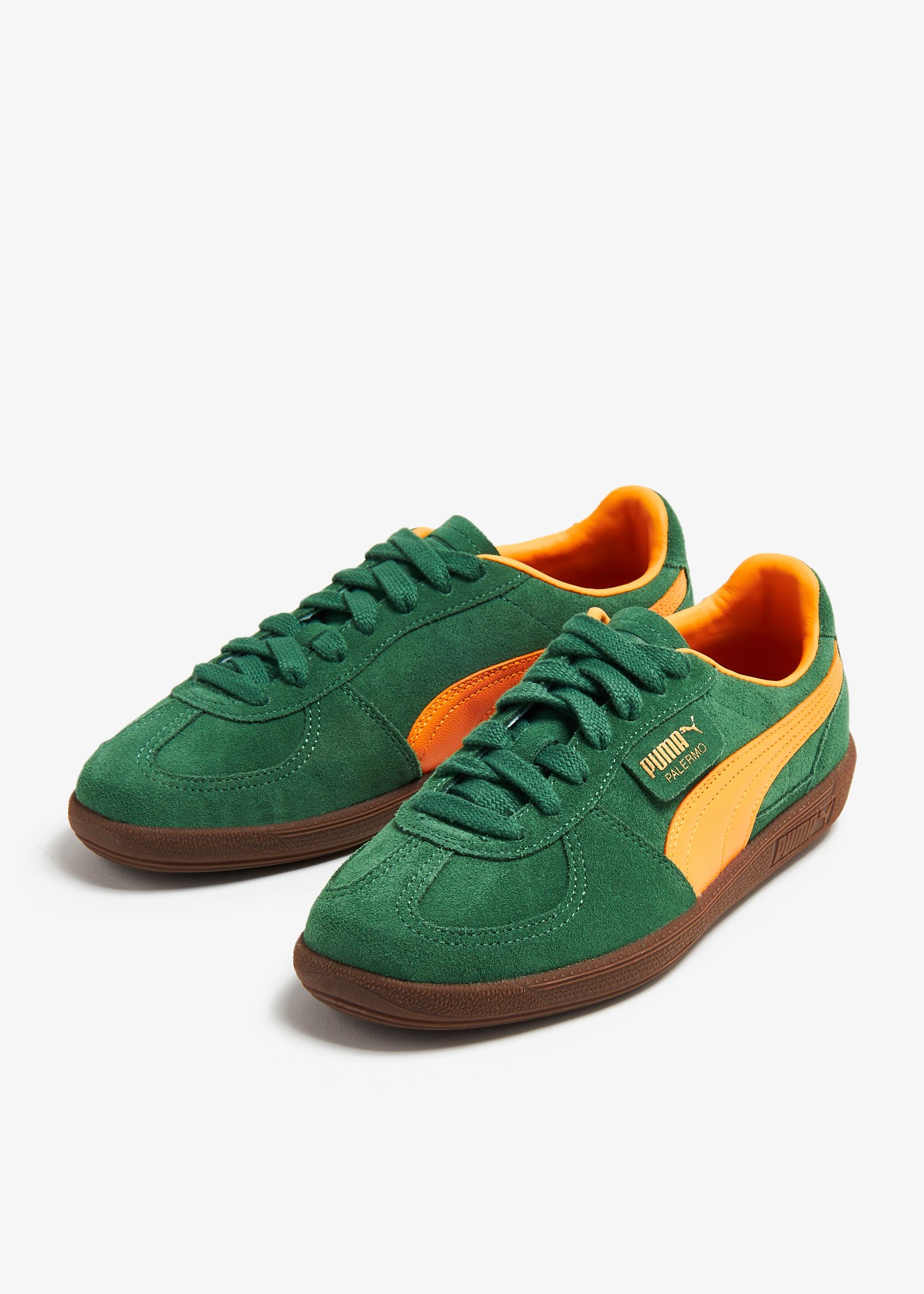 Puma green store and yellow shoes