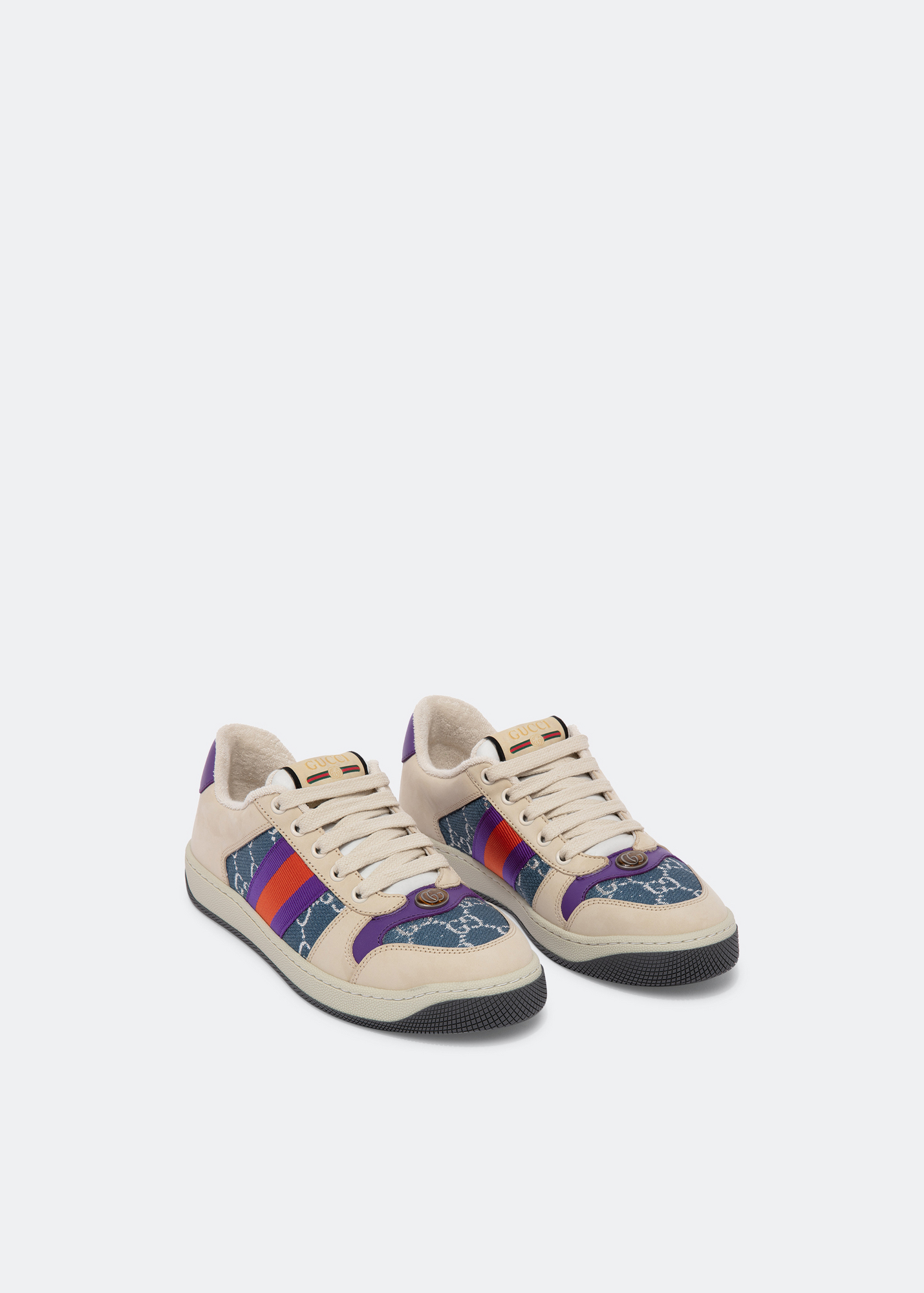 The Screener sneakers mix leather with a mini GG fabric, featuring