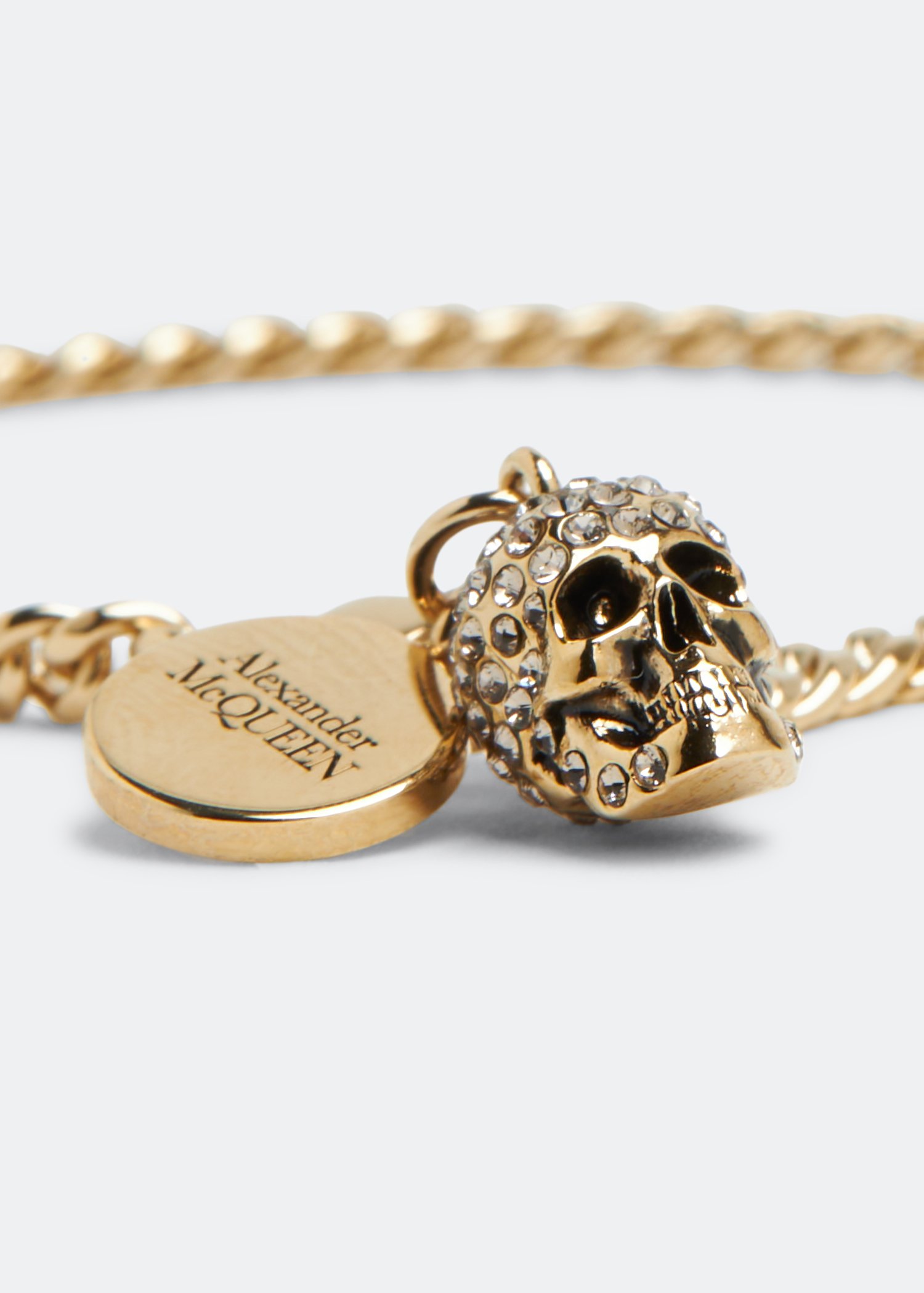 Alexander mcqueen gold hot sale skull bracelet