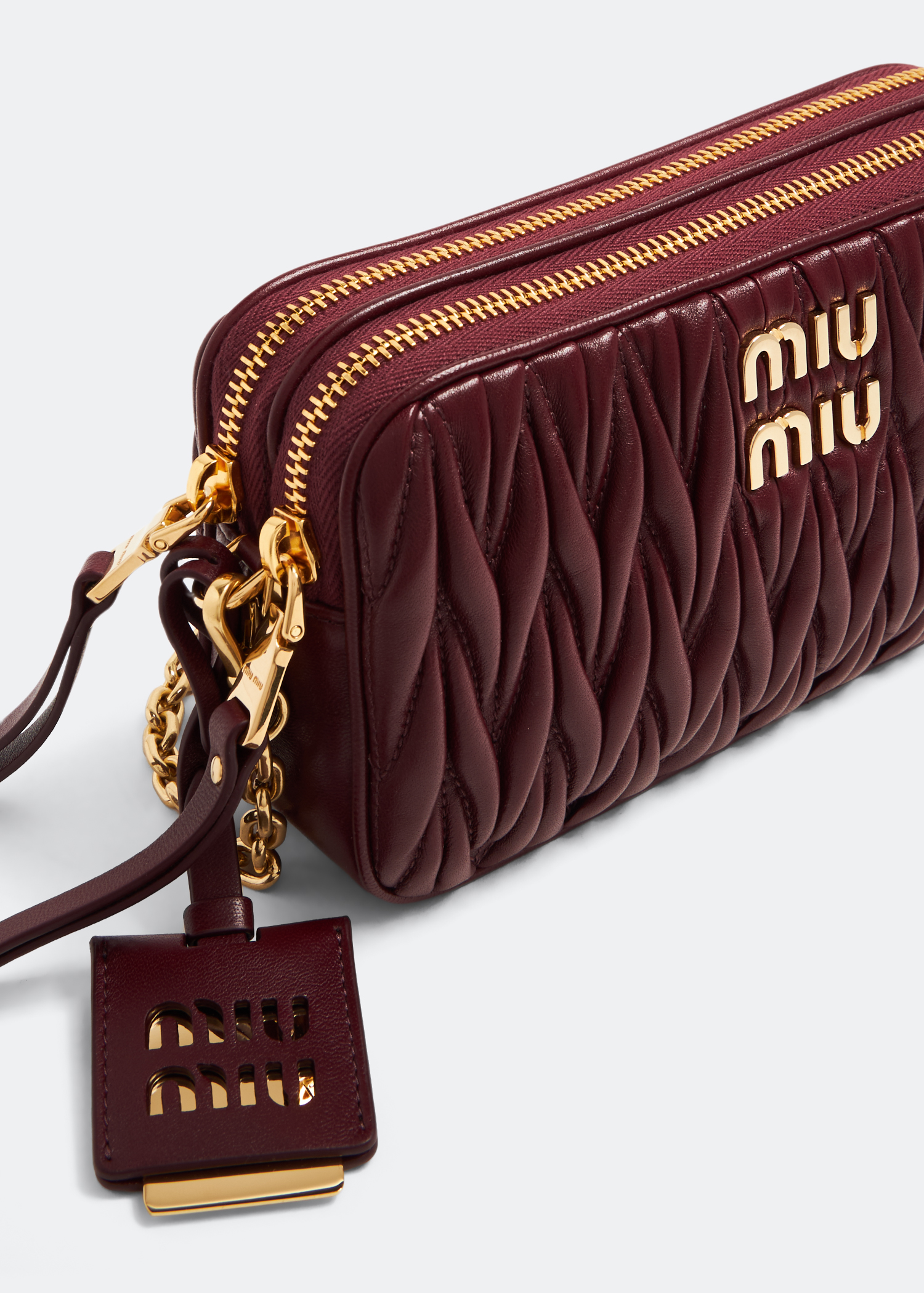 Buy Miu Miu Black Mini Crossbody Bag in Matelassé Nappa Leather for WOMEN  in Oman