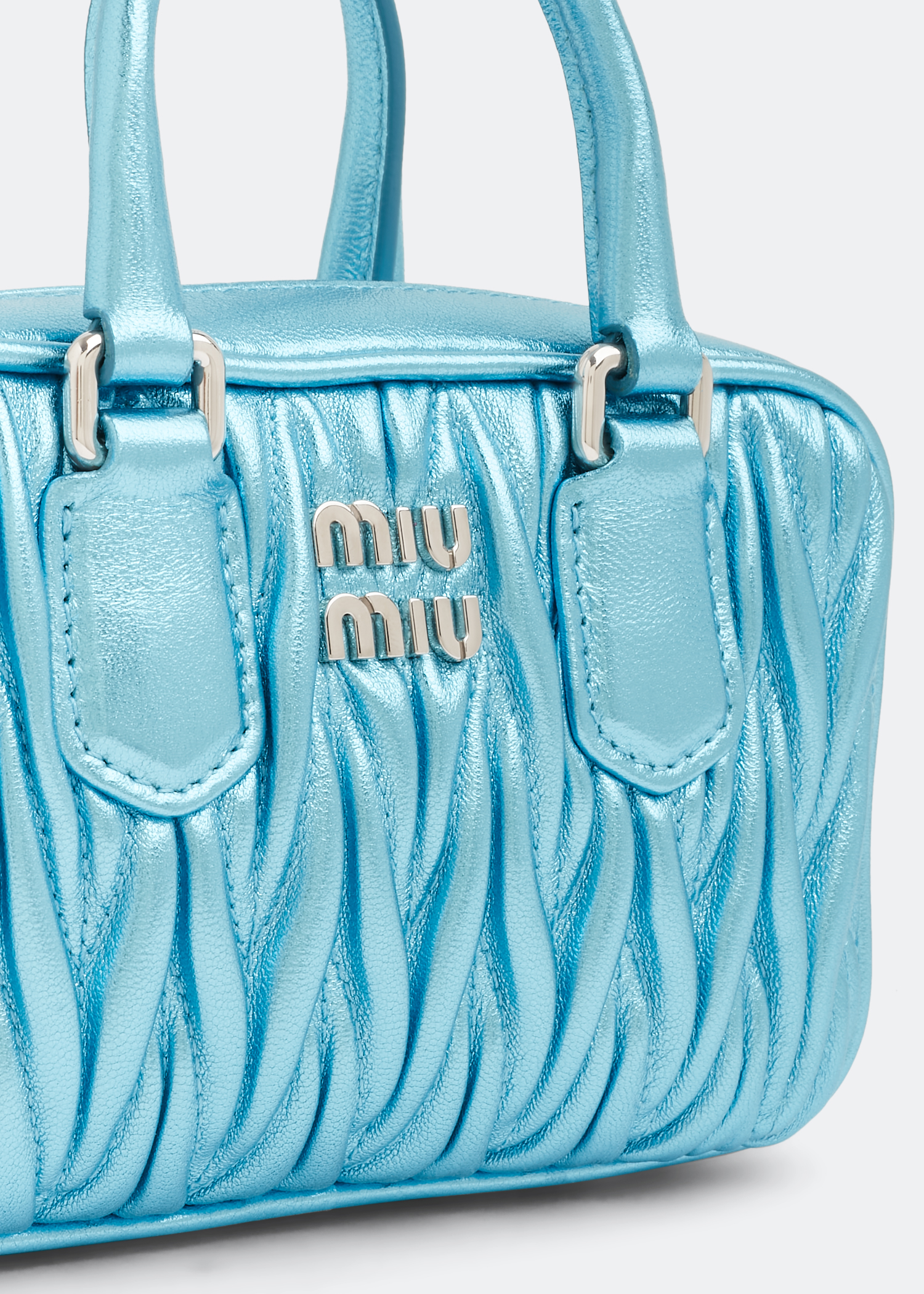 

Matelassé top handle mini bag, Blue