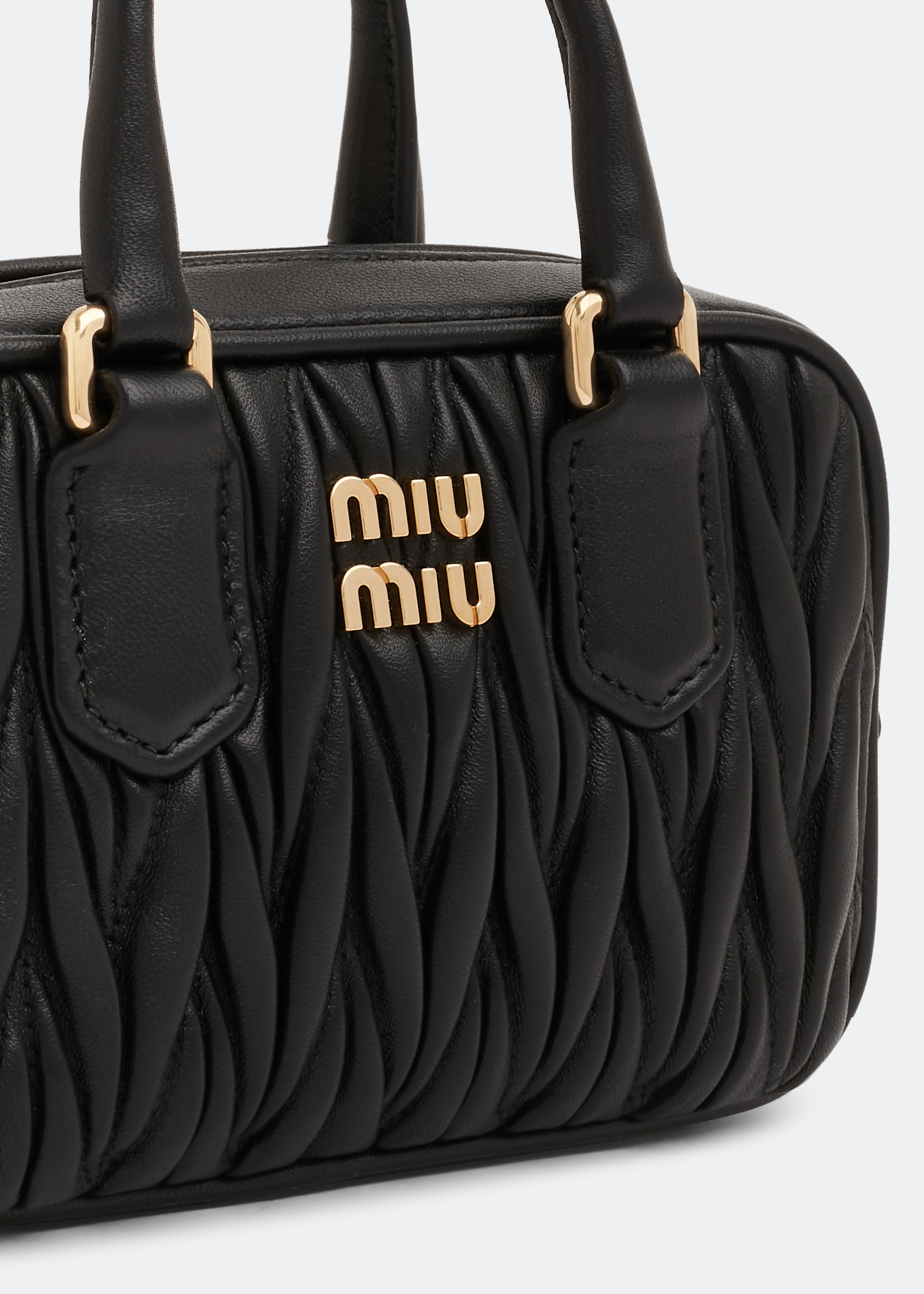 Buy Miu Miu Black Mini Crossbody Bag in Matelassé Nappa Leather for WOMEN  in Oman