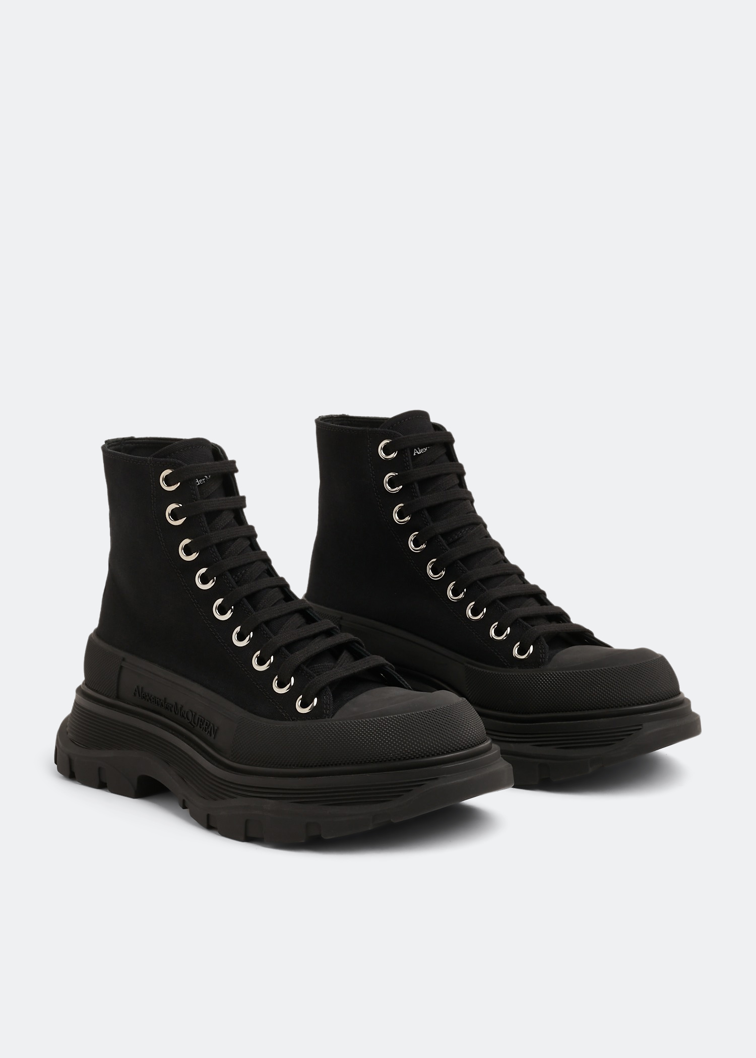 Alexander McQueen Tread Slick boots for Women - Black in UAE