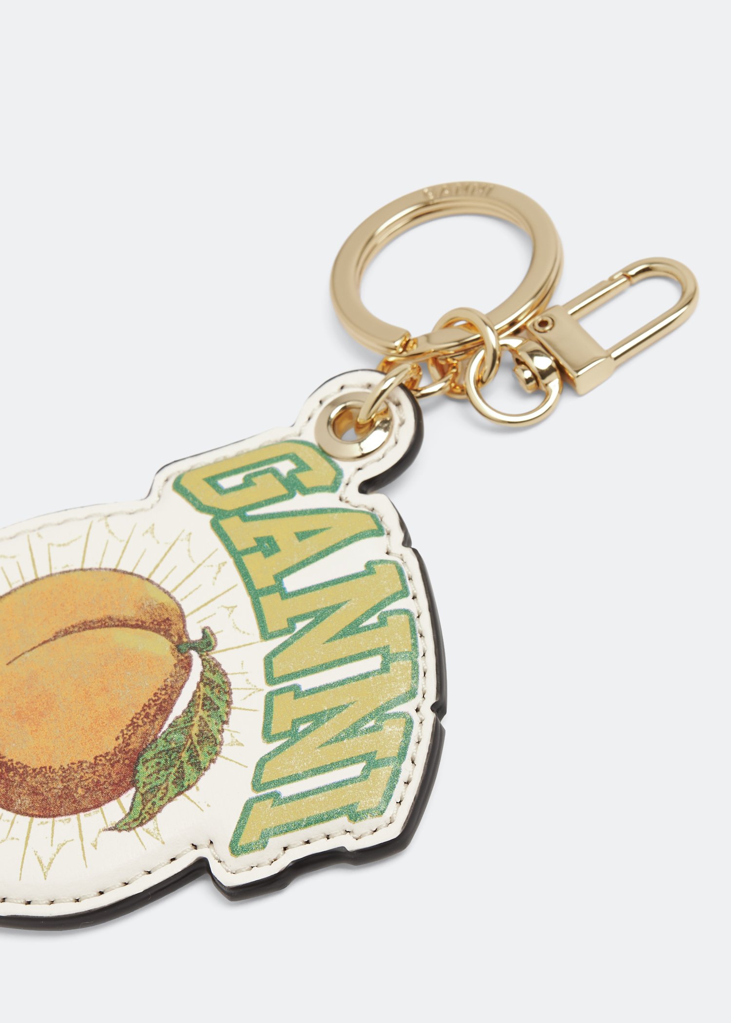 

Peach keychain, Beige