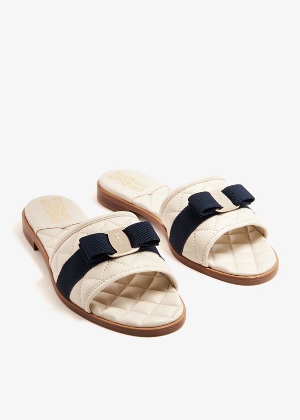 Ferragamo white slides best sale