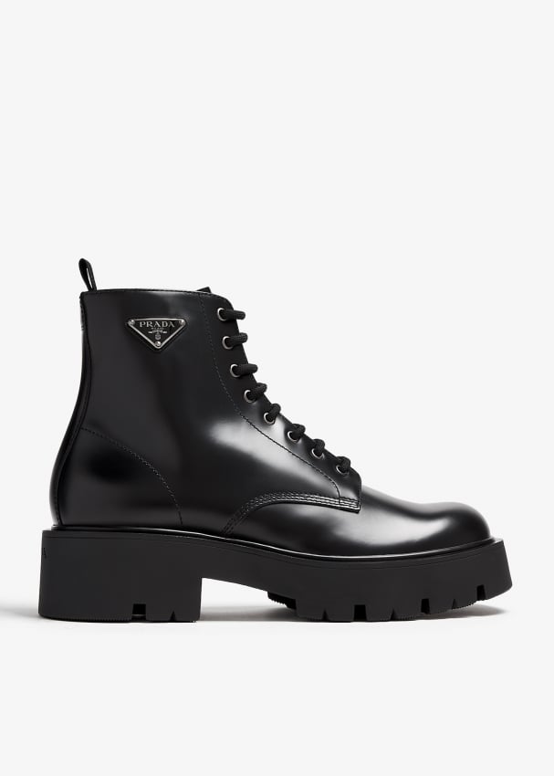 Prada Brushed leather combat boots for Men Black in KSA Level Shoes