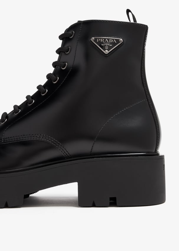 Prada Brushed leather combat boots for Men Black in KSA Level Shoes