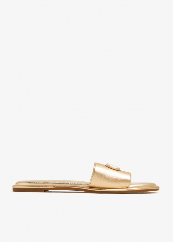 Michael Kors Saylor slide sandals for Women - Gold in UAE | Level Shoes