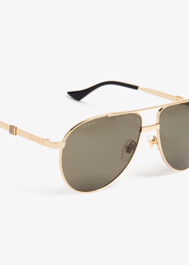 Gucci Navigator frame sunglasses for ADULT UNISEX Men Women Gold in UAE Level Shoes