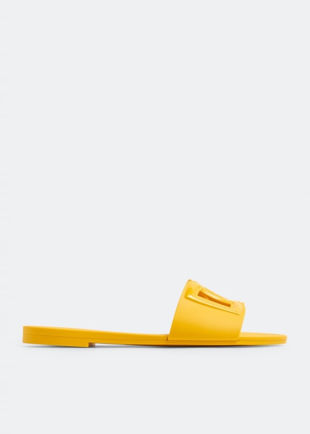Dolce&Gabbana DG logo rubber slides for Women - Yellow in UAE | Level Shoes
