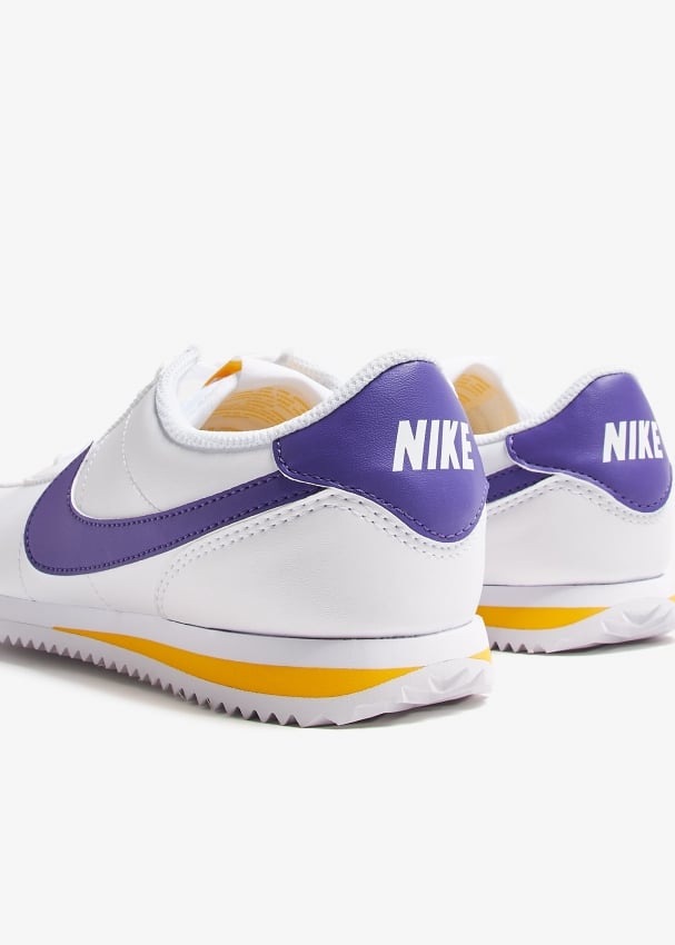 Pink and yellow nike cortez best sale