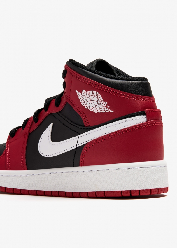 Nike Air Jordan 1 Mid sneakers for Boy Red in Bahrain Level Shoes