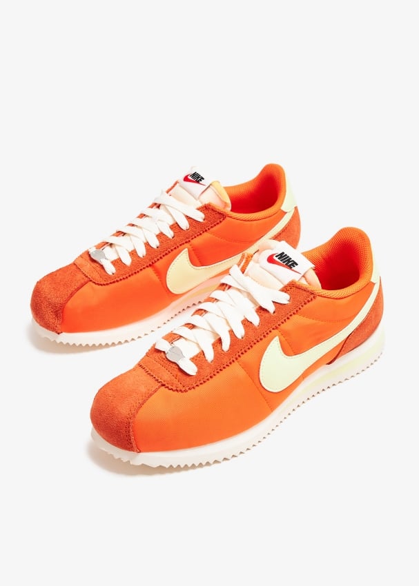 Nike cortez womens orange on sale