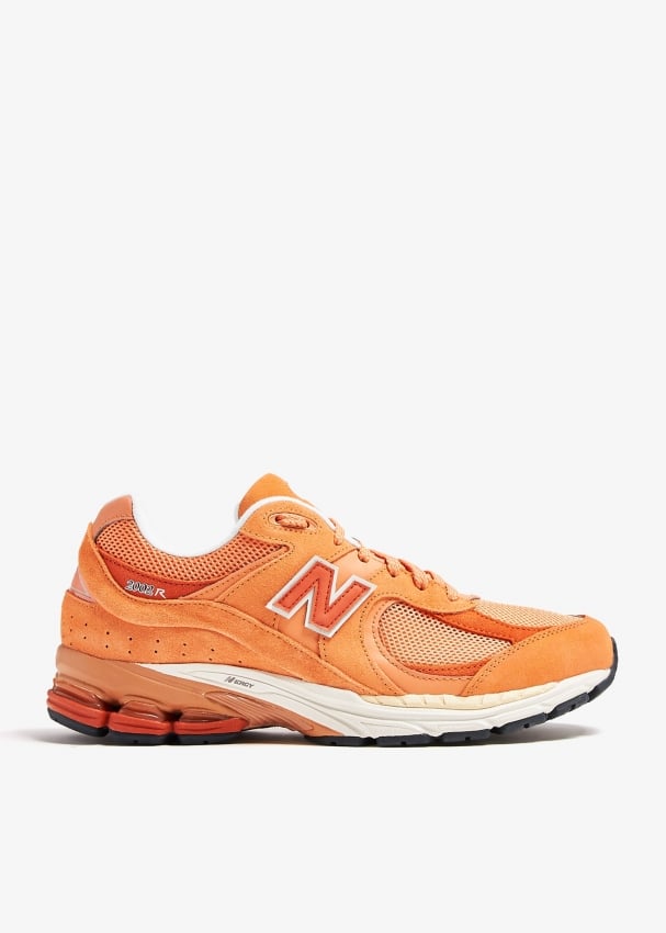 New Balance 2002R sneakers for ADULT UNISEX Men Women Orange in UAE Level Shoes