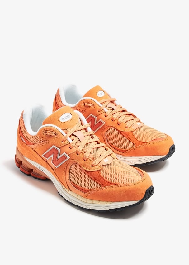 New Balance 2002R sneakers for ADULT UNISEX Men Women Orange in UAE Level Shoes