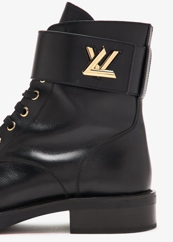 Louis Vuitton Pre Loved Wonderland Flat Ranger boots for Women Black in KSA Level Shoes