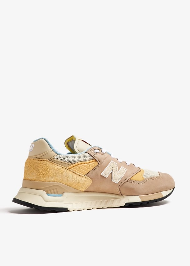 New balance 311 mens gold deals