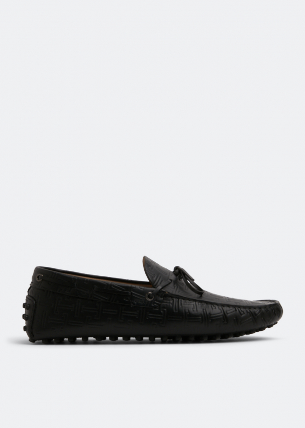 Tod's Gommini driving loafers for Men - Black in UAE | Level Shoes