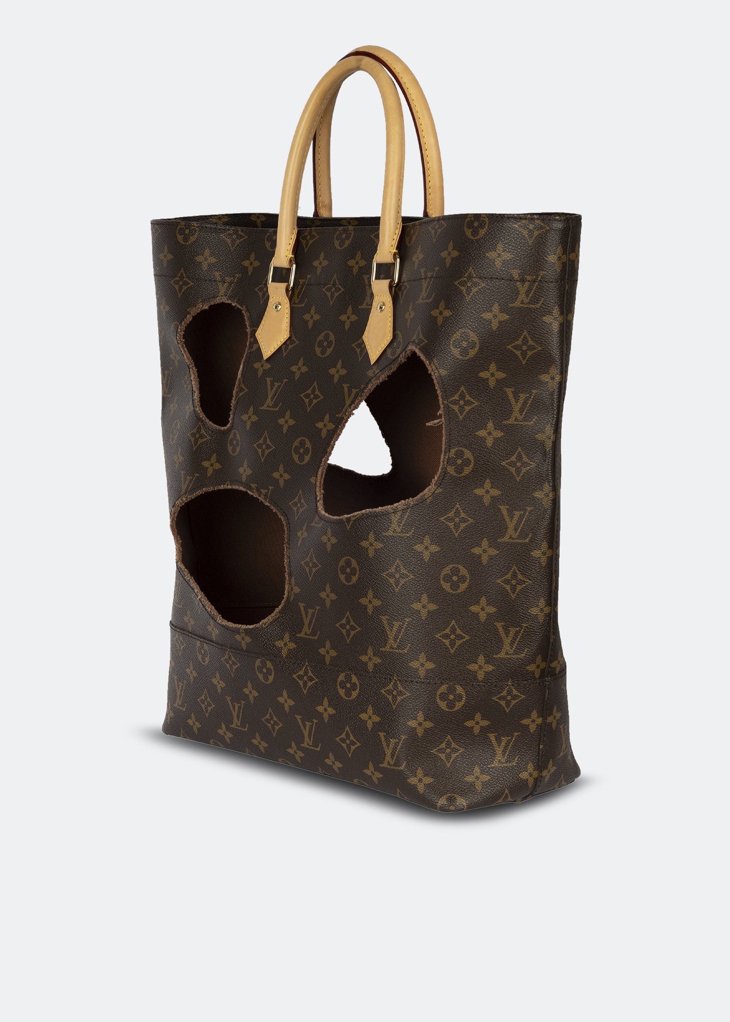 Louis Vuitton Pre-Loved x Comme Des Garçons Burned Holes monogram tote bag  for Women - Brown in Bahrain