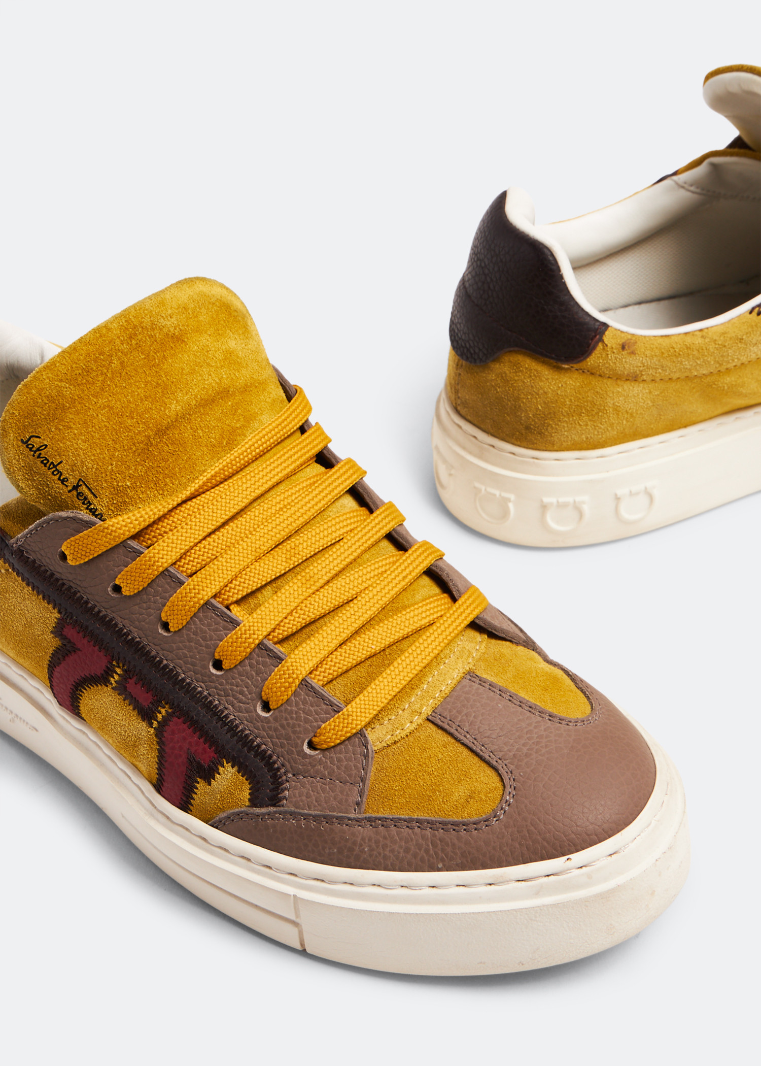 Salvatore Ferragamo Pre Loved Gancini sneakers for Men Yellow in KSA Level Shoes
